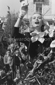Grace Kelly at the battle of flowers. Cannes Film Festival. Cannes 1955. - Photo by Edward Quinn