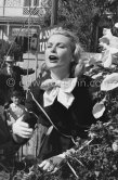 Grace Kelly at the battle of flowers. Cannes Film Festival. Cannes 1955. - Photo by Edward Quinn