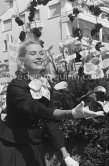 Grace Kelly at the battle of flowers. Cannes Film Festival. Cannes 1955. - Photo by Edward Quinn