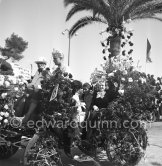 Grace Kelly at the battle of flowers. Cannes Film Festival. Cannes 1955. - Photo by Edward Quinn