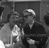 Grace Kelly interviewed for R.T.F. Cannes Film Festival 1955. - Photo by Edward Quinn