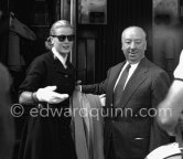 Grace Kelly arriving at the Cannes Railway Station, met by Alfred Hitchcock. It was the third time she was in Europe. In 1947 she came with the family, in 1949 on assignement, she was then a fashion model. Cannes 1954. - Photo by Edward Quinn