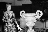 Grace Kelly (later to become Princess Grace) at the Royal Palace just before she met Prince Rainier for the first time. One of Prince Rainier’s personal servants, Michel Demorizi, guided her around some of the great number of rooms of the Royal Palace. Monaco 1955. - Photo by Edward Quinn