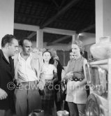 Prince Aly Khan at the summer ceramic exhibition "Japon. Céramique contemporaine" at the Nérolium. Vallauris July 21 1951. - Photo by Edward Quinn