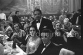 Stavros Livanos, his wife Arietta and their son George. New Year’s Eve gala. Monte Carlo 1956. - Photo by Edward Quinn