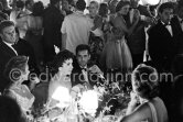 Gina Lollobrigida, centre of attraction, at the gala evening in aid of polio victims. Monte Carlo Sporting Club. Monte Carlo 1955. - Photo by Edward Quinn