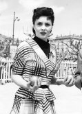 Gina Lollobrigida playing boule at Cannes 1952. - Photo by Edward Quinn