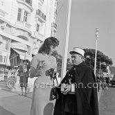 The Police of Nice is interested in Sophia Loren. Promenade des Anglais, in front of Hotel Negresco, Nice 1957. - Photo by Edward Quinn
