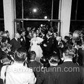 Sophia Loren, wearing an evening gown designed by Emilio Schuberth, making her entry to the Palais du Festival Cannes 27 April 1955. - Photo by Edward Quinn