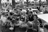 Jayne Mansfield, signing autographs, on a return trip to the Cannes Film Festival 1964. - Photo by Edward Quinn