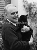 Bruce Marshall with one of his many cats (guess which one: Sammy, Joshua Dew Choir, Casiano, Hengist, Geddes Bijou, Emma, Enzo, Fan-Fan-la-TuIipe, Bunter). Cap d'Antibes 1953. - Photo by Edward Quinn