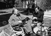 Visit of Laurence Harvey to Somerset Maugham before working in “Of Human Bondage” film. With Maugham's dog George. Villa Mauresque, Saint-Jean-Cap-Ferrat 1963. - Photo by Edward Quinn
