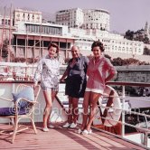 Greek armateur Basil M. Mavroleon with his wife and daughter on his Yacht Radiant II. Monaco 1961. - Photo by Edward Quinn