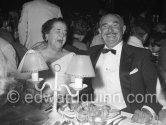 Gossip columnist Elsa Maxwell and film producer Jack Warner (Warner Brothers), summer gala at Sporting d’Eté. Monte Carlo 1957 - Photo by Edward Quinn
