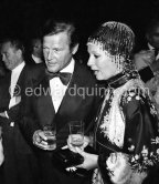 Roger Moore and his wife Luisa Mattioli. Wedding Party of Curd Jürgens and Margie, La Vieille Bastide, Saint-Paul-de-Vence 1978 - Photo by Edward Quinn