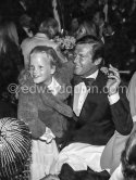 Roger Moore and Miriam Schgmitz, daughter of Margie. Wedding Party of Curd Jürgens and Margie, La Vieille Bastide, Saint-Paul-de-Vence 1978 - Photo by Edward Quinn