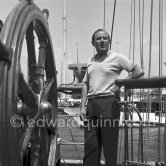 Stavros Niarchos in front of his schooner Le Créole. Villefranche 1955. - Photo by Edward Quinn