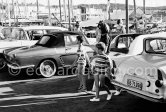 Philip and Spyros Niarchos with her mother Eugénie. Saint-Tropez 1961. Cars: Opel Kapitän, Renault Floride, Autobianchi Binchina Transformabile, Ford Anglia - Photo by Edward Quinn