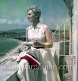 Kim Novak at Cannes in 1956., the year she was voted American number one box-ofﬁce star and Queen of the Cannes Film Festival. She lived up to her role by bringing 20 cocktail and evening dresses and 25 pairs of shoes for her one-week stay. - Photo by Edward Quinn