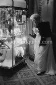 Kim Novak in the lobby of the Carlton Hotel. Cannes 1955. - Photo by Edward Quinn