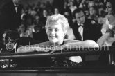 Kim Novak at a gala evening in Cannes in 1956, the year she was voted American number one box-ofﬁce star and Queen of the Cannes Film Festival. - Photo by Edward Quinn