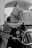Kim Novak’s departure. The Cannes Film Festival being finished, she Is leaving for Italy. Carlton Hotel Cannes 1956. Car: 1954 or 55 Cadillac Series 75 Fleetwood Sedan or Limousine. - Photo by Edward Quinn