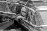 Kim Novak’s departure. The Cannes Film Festival being finished, she Is leaving for Italy. Carlton Hotel Cannes 1956. Car: 1954 or 1955 Cadillac Series 75 Fleetwood Sedan or Limousine. - Photo by Edward Quinn