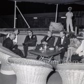 On board the Christina during a cocktail Onassis gave. From left to right Mr. Salmona, Mr. Mirotis, Aristotle Onassis, Stavros Niarchos and Onassis' sister Artemis Garoufalidi. Monaco 1957. - Photo by Edward Quinn