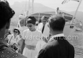 Maria Callas and Aristotle Onassis leaving Onassis' yacht Christina. Monaco harbor 1959. - Photo by Edward Quinn