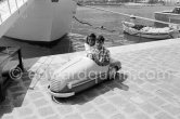 Aristotle and Tina Onassis' children Alexander and Christina. Monaco harbor 1957. - Photo by Edward Quinn
