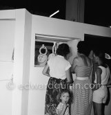 Vase in a mirror. Ceramic exposition Vallauris 1952. - Photo by Edward Quinn
