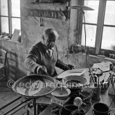 Pablo Picasso works on "Le picador" at the Madoura pottery. Vallauris 23.3.1953. - Photo by Edward Quinn