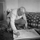 Drawing lesson given by Pablo Picasso to his children Claude Picasso and Paloma Picasso. La Galloise, Vallauris 16.4.1953. - Photo by Edward Quinn