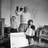Drawing lesson given by Pablo Picasso to his children Claude Picasso and Paloma Picasso. La Galloise, Vallauris 16.4.1953. - Photo by Edward Quinn