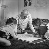 Drawing lesson given by Pablo Picasso to his children Claude Picasso and Paloma Picasso. La Galloise, Vallauris 16.4.1953. - Photo by Edward Quinn