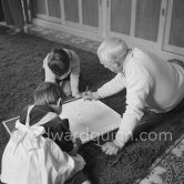 Drawing lesson given by Pablo Picasso to his children Claude Picasso and Paloma Picasso. La Galloise, Vallauris 16.4.1953. - Photo by Edward Quinn