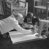 Drawing lesson given by Pablo Picasso to his children Claude Picasso and Paloma Picasso. La Galloise, Vallauris 16.4.1953. - Photo by Edward Quinn