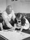 Drawing lesson given by Pablo Picasso to his children Claude Picasso and Paloma Picasso. La Galloise, Vallauris 16.4.1953. - Photo by Edward Quinn