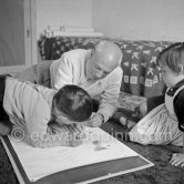 Drawing lesson given by Pablo Picasso to his children Claude Picasso and Paloma Picasso. La Galloise, Vallauris 16.4.1953. - Photo by Edward Quinn
