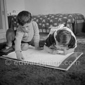 Drawing lesson given by Pablo Picasso to his children Claude Picasso and Paloma Picasso. La Galloise, Vallauris 16.4.1953. - Photo by Edward Quinn