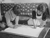 Drawing lesson given by Pablo Picasso to his children Claude Picasso and Paloma Picasso. La Galloise, Vallauris 16.4.1953. - Photo by Edward Quinn