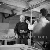 Pablo Picasso would sometimes squeeze a vase before the clay had hardened, molding it into a representational shape. "To give it life," he once said, "I have to wring its neck." Delighted that he could make the clay respond to any fantasy that passed through his mind, he shaped mythologicat figures such as fauns and satyrs, as well as vases representing graceful women, bulls, goats, fish, and above all, owls and doves. Here Pablo Picasso is working on small bird sculpture, Luciano Emmer film. Madoura pottery, Vallauris 14./15.10.1953. - Photo by Edward Quinn