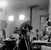 Pablo Picasso checking a camera angle during filming of Luciano Emmer's documentary. Le Fournas, Vallauris 1953. - Photo by Edward Quinn