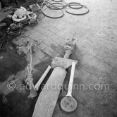 Pablo Picasso working in his sculpture studio Le Fournas making a sculpture figure with odds and ends from his scrap heap. The branch was later replaced by a key. The finished sculpture got the name "La femme à la clé (La Taulière)" ("Woman with a key"). Le Fournas, Vallauris 1953. - Photo by Edward Quinn