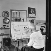 Pablo Picasso doing a charcoal drawing of the view from Le Fournas during filming of Luciano Emmer's documentary. Vallauris 26.6.1953. - Photo by Edward Quinn
