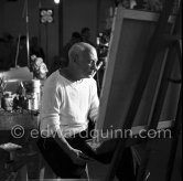 Pablo Picasso doing a charcoal drawing of the view from Le Fournas ("Vue de Village", 26.6.1953.) during filming of Luciano Emmer's documentary. Vallauris 26.6.53 - Photo by Edward Quinn