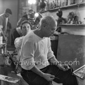Pablo Picasso doing a charcoal drawing of the view from Le Fournas. Luciano Emmer's documentary. Vallauris 26 June 1953. - Photo by Edward Quinn