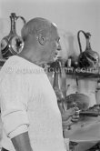 Portrait of Pablo Picasso in white pullover at his studio Le Fournas. Vallauris 1953. - Photo by Edward Quinn
