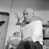 Portrait of Pablo Picasso in white pullover at his studio Le Fournas. Vallauris 1953. - Photo by Edward Quinn