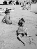 Paloma Picasso and Claude Picasso at the beach of Golfe-Juan 1954. - Photo by Edward Quinn